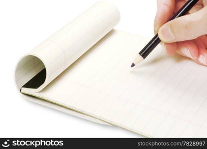 Pencil in hand writing on the notebook