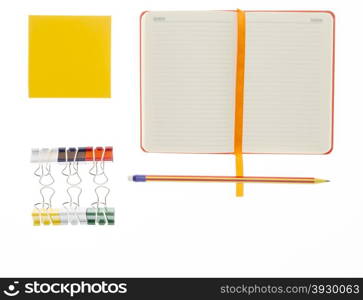 Pencil,notebook and paper clips on white background