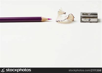 pencil with pencil shavings sharpener