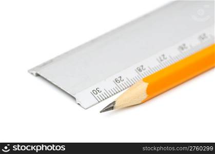Pencils and ruler on a white background