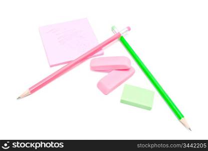 pencils, erasers and sticky note on white