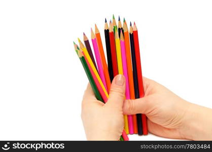 Pencils in a hand isolated on a white background