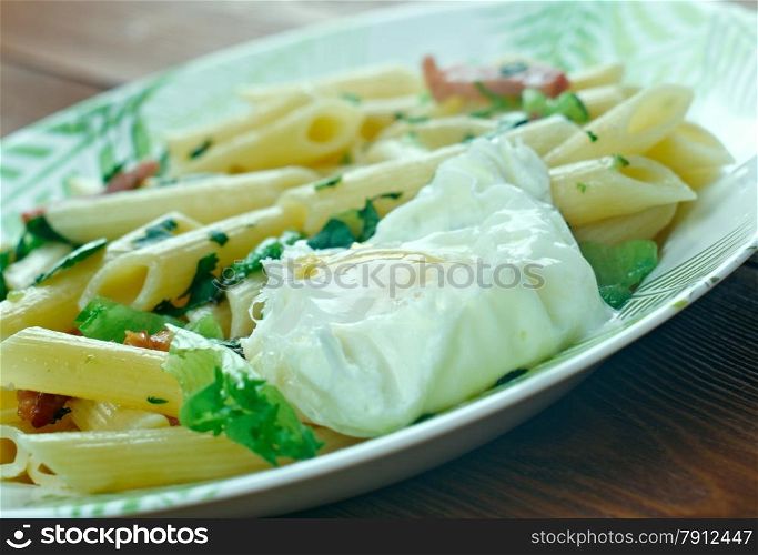 Penne Florentine with bacon and poached egg