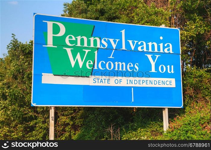 Pennsylvania Welcomes You road sign at the state border