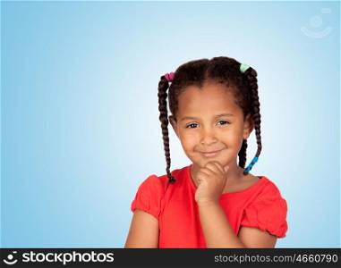 Pensive african lgirl isolated on a blue background
