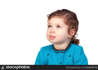 Pensive baby girl isolated over white background