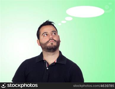 Pensive bearded men in black isolated on green background