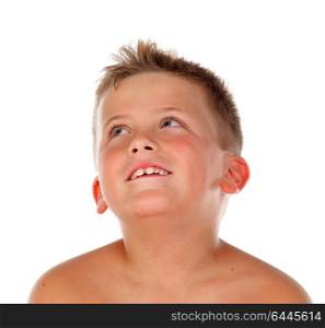 Pensive blond child looking up isolated on a white background