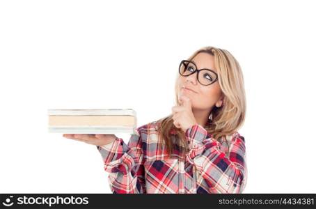 Pensive blonde girl with glasses and books oh the hand isolated on a white background