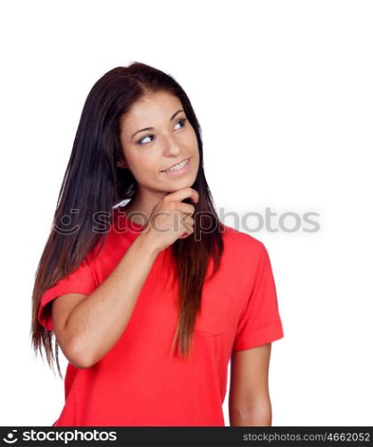 Pensive brunette girl dressed in red isolated on a white background