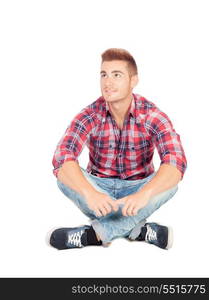 Pensive casual boy sitting on the floor isolated on white background