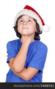 Pensive child with Santa hat isolated on white background