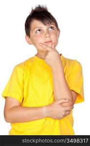 Pensive child with yellow t-shirt isolated on white background