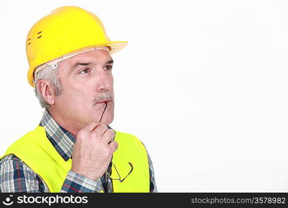 Pensive construction worker