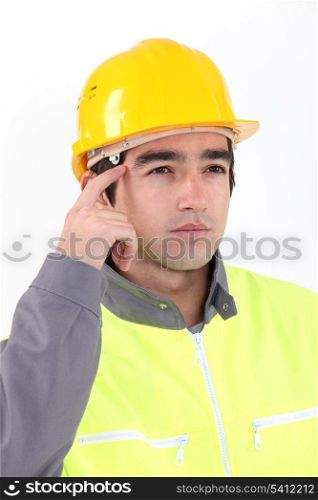 Pensive construction worker.