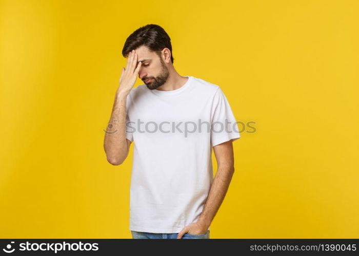 Pensive curious man looking up in thinking pose trying to make choice or decision isolated on yellow background. Pensive curious man looking up in thinking pose trying to make choice or decision isolated on yellow background.