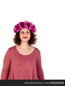 Pensive curvy girl with a flowered headdress isolated on a white background