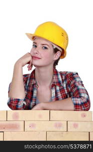 Pensive female construction worker