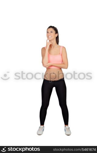 Pensive girl with sports clothes isolated on a white background