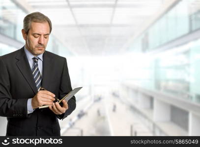 pensive mature business man at the office