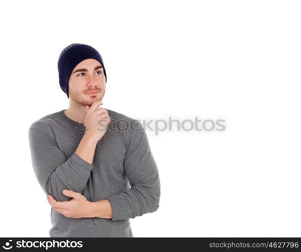 Pensive muscled man with wool hat isolated on a white background