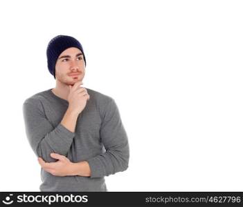 Pensive muscled man with wool hat isolated on a white background