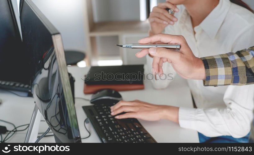 Pensive programmer working on desktop pc programming code technologies or website design at office Software Development Company
