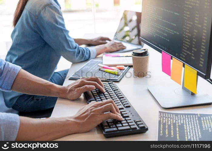 Pensive programmer working on on desktop pc programming code technologies or website design at office Software Development Company.