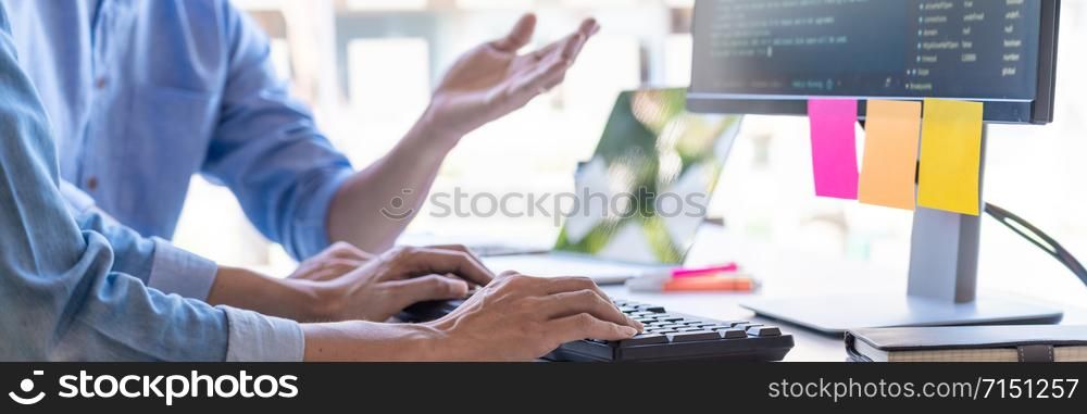 Pensive programmer working on on desktop pc programming code technologies or website design at office Software Development Company.