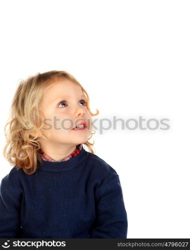 Pensive small blond child isolated on a white background