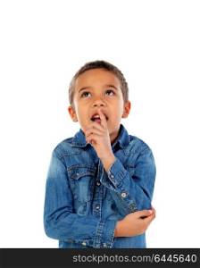 Pensive small child with denim t-shirt isolated on a white background