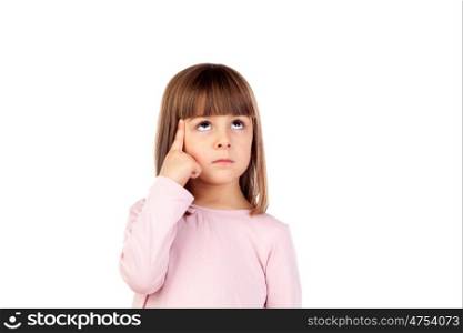 Pensive small girl with pink t-shirt isolated on a white background