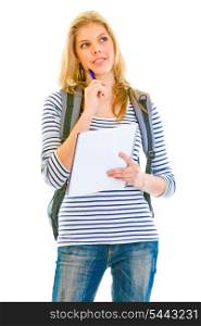 Pensive teengirl with schoolbag holding notebook and pen in hands isolated on white &#xA;