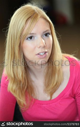 Pensive young blond woman
