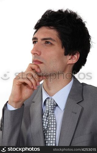Pensive young businessman