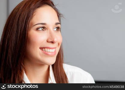 Pensive young girl relaxing at home looking at side