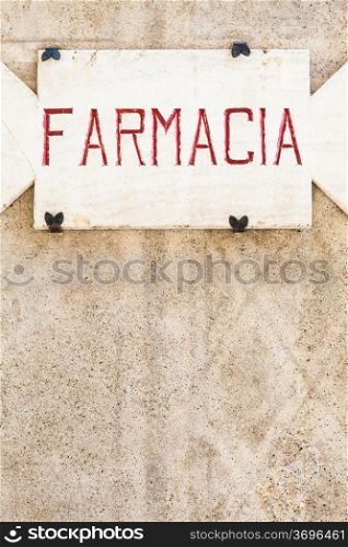 Penza, Tuscany region - Italy. An old pharmacy sign made of stone
