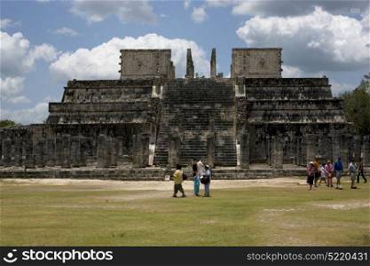 people a wild angle of the chichen itza temple in tulum mexico