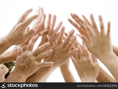 People&acute;s hands raised