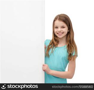 people, advertisement and sale concept - happy little girl with blank white board