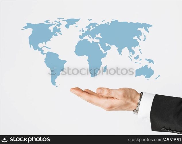 people and business concept - close up of businessman hand showing world map. close up of businessman hand showing world map