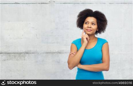 people and concept - happy afro american young woman over white. happy afro american young woman over white