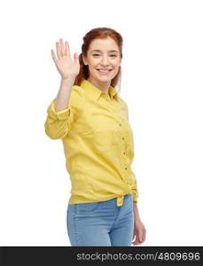 people, and gesture concept - happy smiling young woman waving hand over white