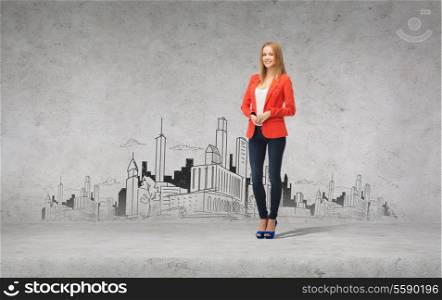 people and happiness concept - beautiful teenage girl in casual clothes on high heels with city drawing on the back