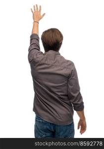 people and human rights concept - man with raised hand showing stop gesture over white background. man with raised hand showing stop gesture