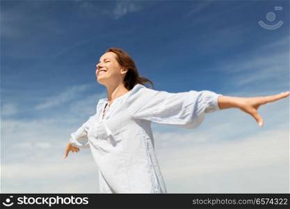 people and leisure concept - happy smiling woman enjoying summer. happy smiling woman enjoying summer