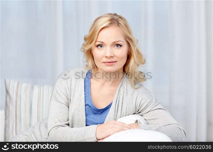people and leisure concept - middle aged woman at home. middle aged woman at home