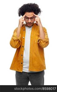 people and mind concept - thinking man in glasses and yellow jacket over white background. thinking man in glasses and yellow jacket