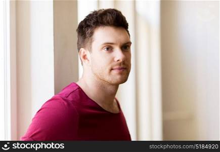 people and portrait concept - handsome young man. portrait of handsome young man