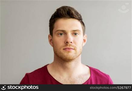 people and portrait concept - handsome young man. portrait of handsome young man